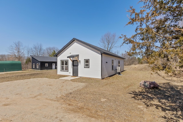 2084 W Fenwick Rd, Fenwick, MI 48834 - view of front facade with central AC unit
