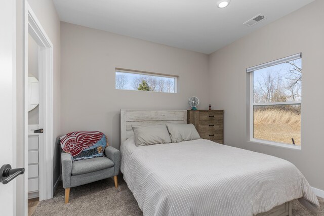 2084 W Fenwick Rd, Fenwick, MI 48834 - carpeted bedroom featuring visible vents