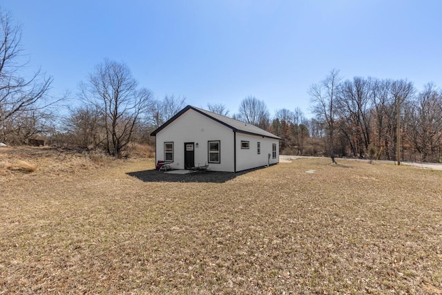 2084 W Fenwick Rd, Fenwick, MI 48834 - exterior space with a front lawn