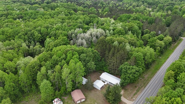 6780 N High Bridge Rd, Brethren, MI 49619 - drone / aerial view of a heavily wooded area