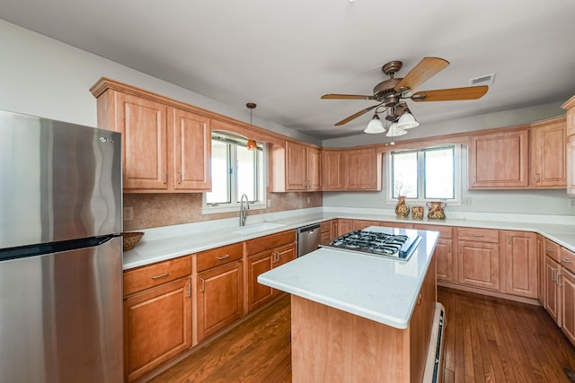 7295 Dutch Rd, Goodrich Vlg, MI 48438 - kitchen featuring dark wood-style floors, ceiling fan, a sink, and stainless steel appliances