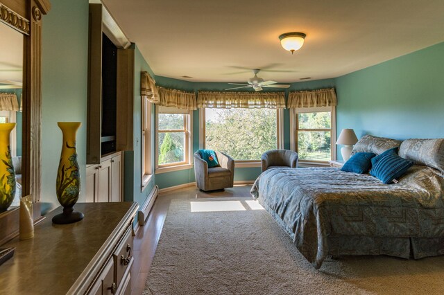 7295 Dutch Rd, Goodrich Vlg, MI 48438 - bedroom with a baseboard radiator and baseboards