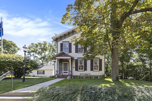 320 N Division St, Marshall, MI 49068 - italianate-style house featuring a front lawn