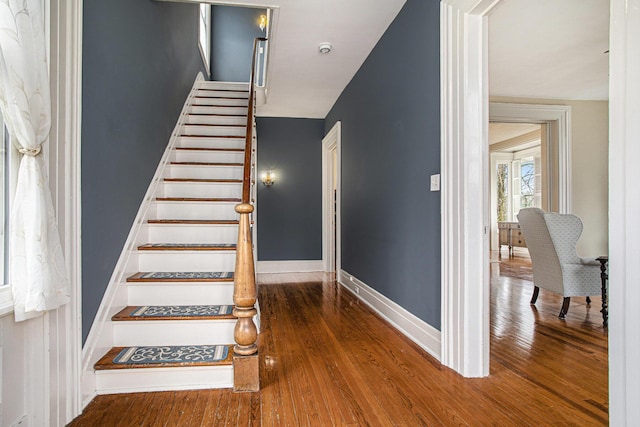 320 N Division St, Marshall, MI 49068 - stairway with hardwood / wood-style flooring and baseboards
