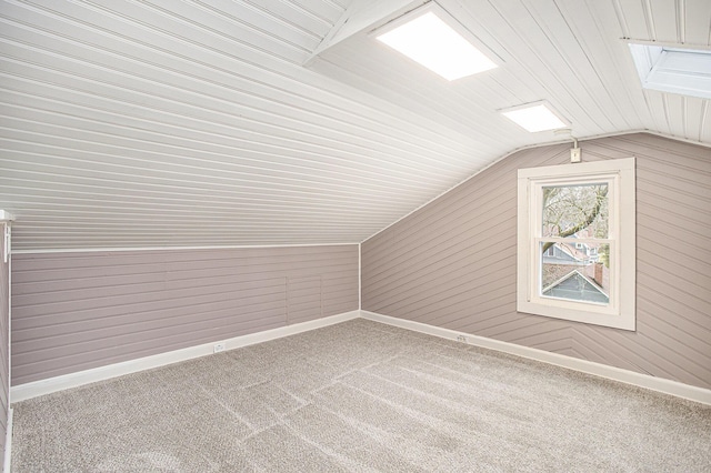 320 N Division St, Marshall, MI 49068 - bonus room featuring carpet flooring, baseboards, and lofted ceiling with skylight