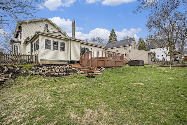 320 N Division St, Marshall, MI 49068 - rear view of property featuring a yard, a wooden deck, and fence