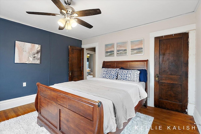 548 Pleasant St SE, Grand Rapids, MI 49503 - bedroom with wood finished floors and ceiling fan