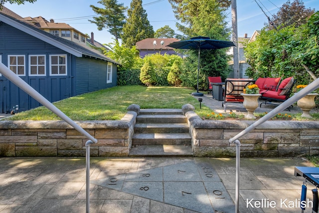 548 Pleasant St SE, Grand Rapids, MI 49503 - view of patio with an outdoor living space