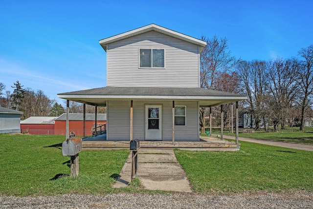 farmhouse featuring roof with shingles, a porch, and a front lawn