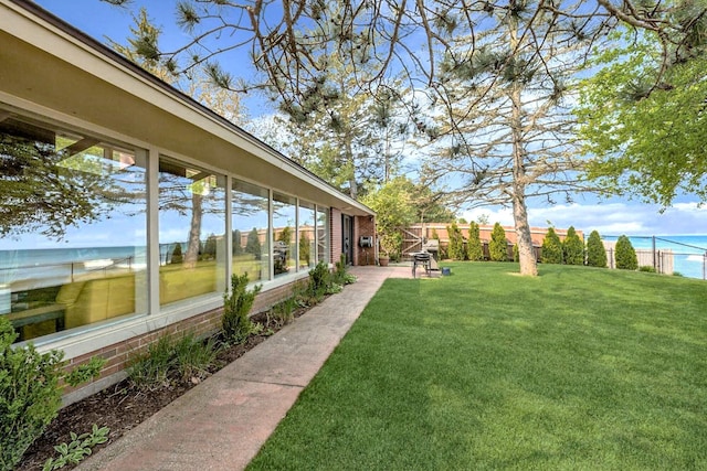 19279 Ravine Dr, New Buffalo, MI 49117 - view of yard with a water view and fence
