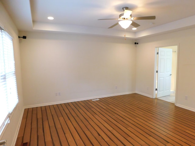 2535 Holiday House Rd Unit 24, Saint Joseph, MI 49085 - unfurnished room featuring a tray ceiling, ceiling fan, recessed lighting, and baseboards
