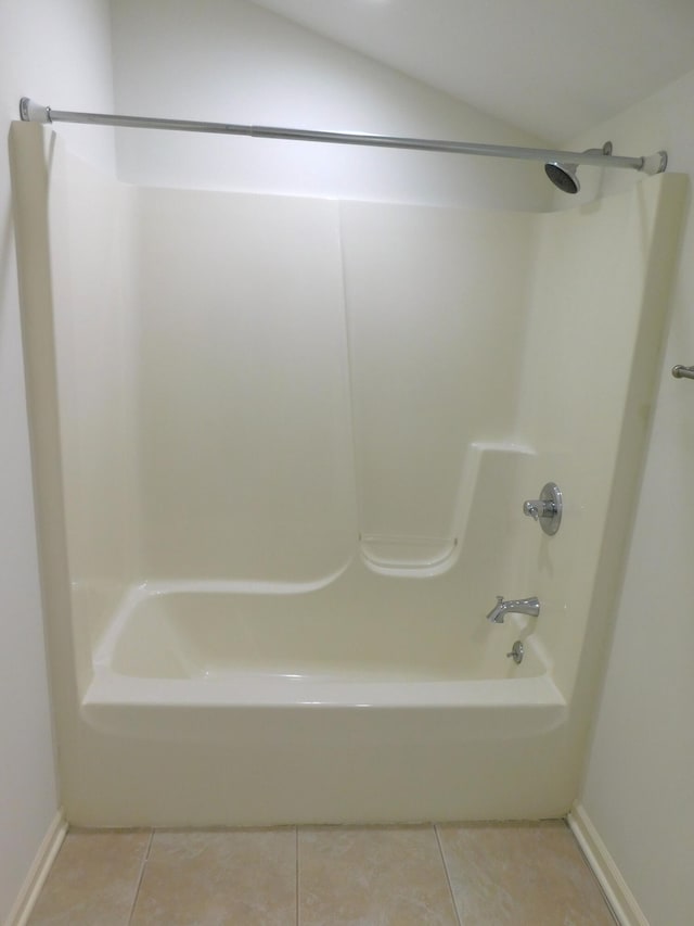 2535 Holiday House Rd Unit 24, Saint Joseph, MI 49085 - full bathroom with tile patterned floors, baseboards, and shower / bath combination