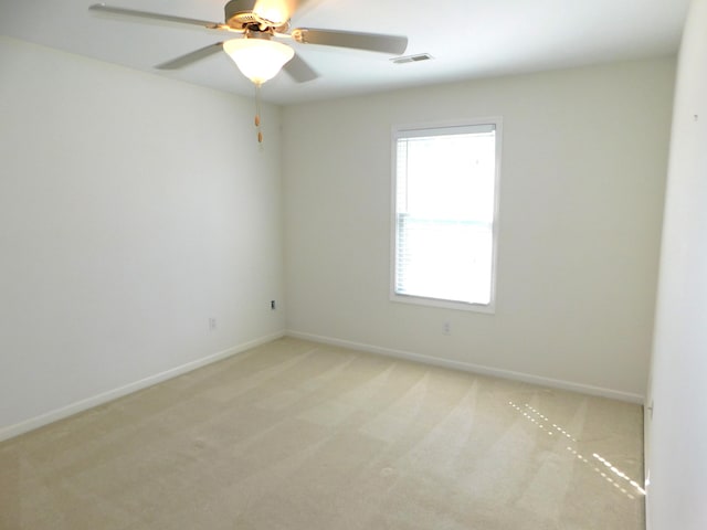 2535 Holiday House Rd Unit 24, Saint Joseph, MI 49085 - unfurnished room featuring carpet, baseboards, and a ceiling fan