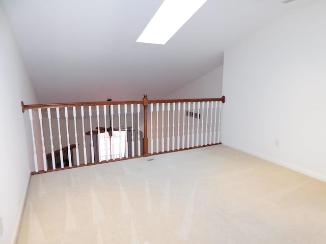 2535 Holiday House Rd Unit 24, Saint Joseph, MI 49085 - bonus room with a skylight, carpet, baseboards, and lofted ceiling
