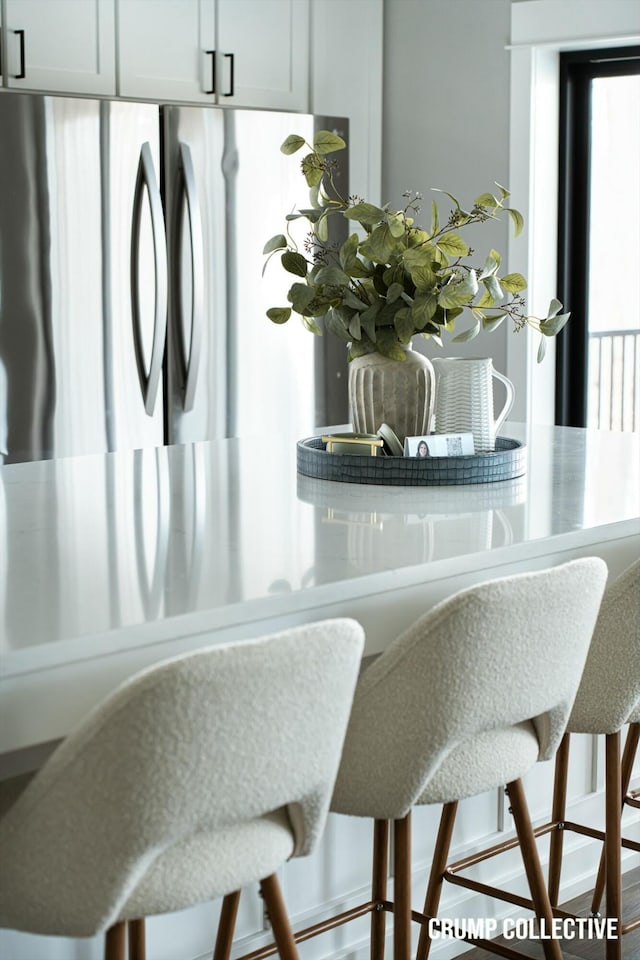 details featuring freestanding refrigerator