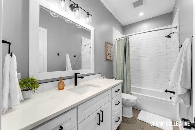 bathroom featuring toilet, vanity, shower / bathtub combination with curtain, and visible vents