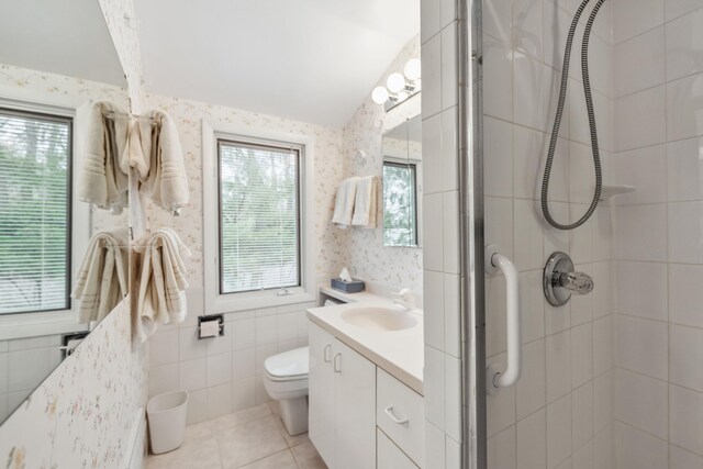 4117 Lake Shore Dr, New Buffalo, MI 49117 - full bathroom featuring tile patterned floors, wallpapered walls, vanity, toilet, and tiled shower