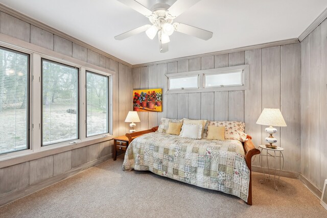4117 Lake Shore Dr, New Buffalo, MI 49117 - bedroom featuring wood walls, ornamental molding, carpet flooring, and baseboards