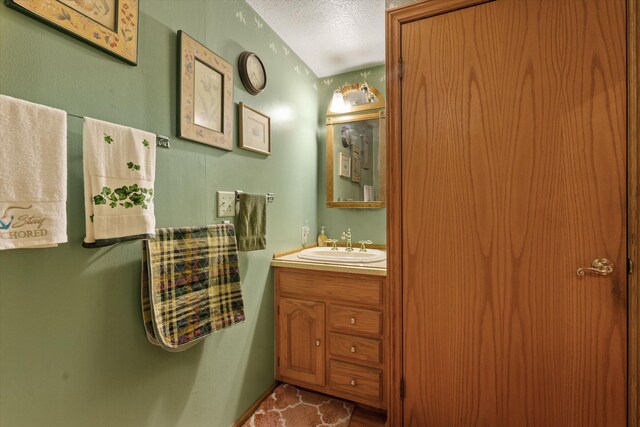 33028 Pokagon Hwy, Niles, MI 49120 - bathroom featuring a textured ceiling and vanity