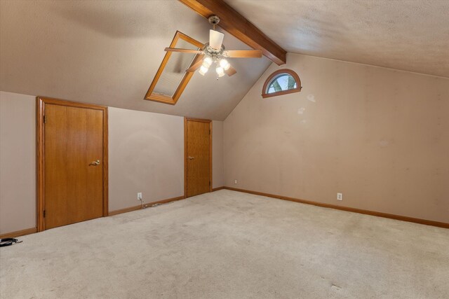 33028 Pokagon Hwy, Niles, MI 49120 - additional living space with lofted ceiling with beams, light carpet, baseboards, and a textured ceiling