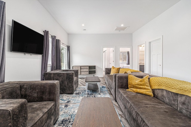1641 N Arrowhead Rd, Mears, MI 49436 - living room with wood finished floors, visible vents, and recessed lighting