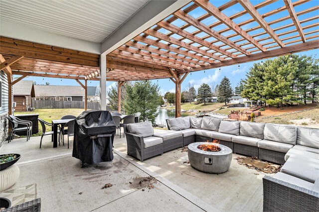 1641 N Arrowhead Rd, Mears, MI 49436 - view of patio with a pergola, area for grilling, an outdoor living space with a fire pit, outdoor dining area, and fence