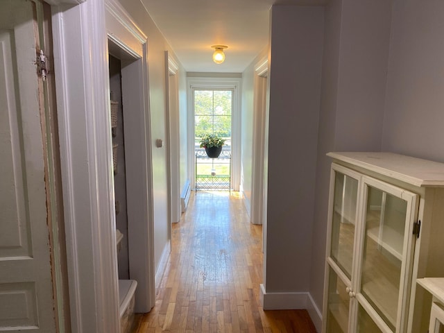 227 Railroad St, Chelsea, MI 48118 - corridor featuring light wood-style flooring and baseboards
