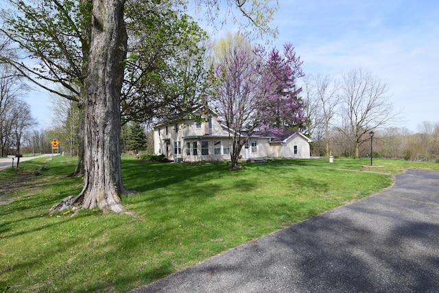 view of front of property with a front lawn
