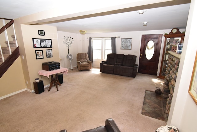 living area with stairway, baseboards, and carpet flooring