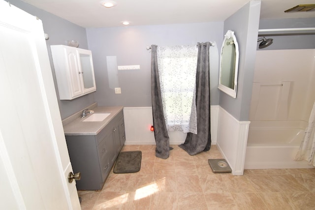 full bath featuring shower / bathtub combination, tile patterned flooring, vanity, and visible vents