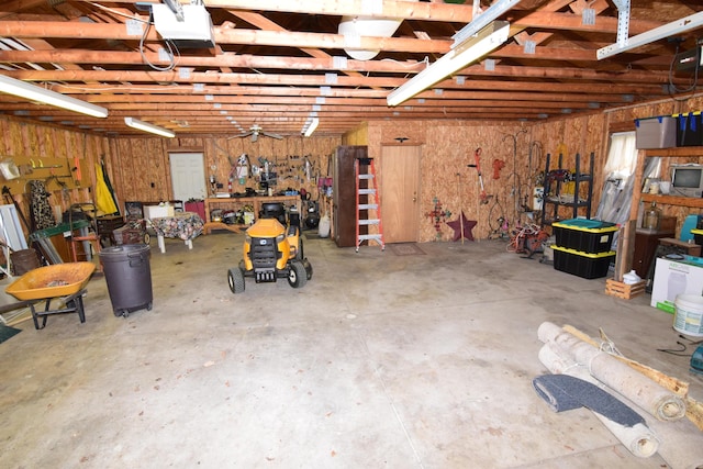 garage with a workshop area