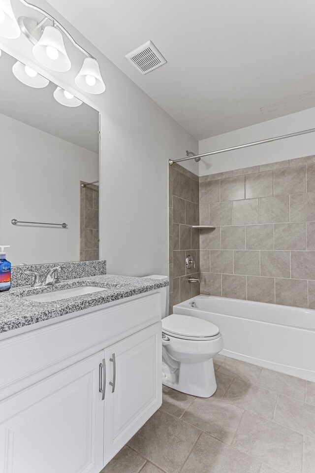 full bathroom featuring shower / tub combination, visible vents, toilet, and vanity