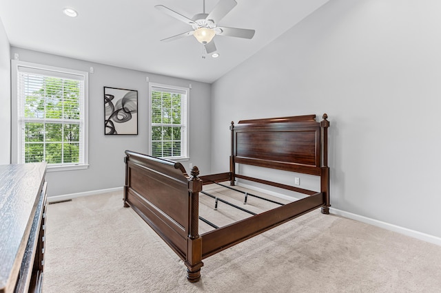 carpeted bedroom featuring multiple windows, lofted ceiling, recessed lighting, and baseboards