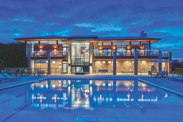 2808 Rathmore Ln, Ann Arbor, MI 48105 - community pool featuring a patio and fence