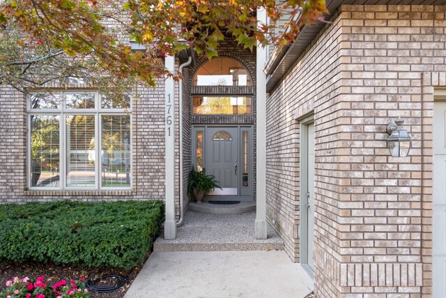 1761 S Shore Dr, Holland, MI 49423 - property entrance with brick siding