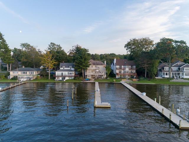 1761 S Shore Dr, Holland, MI 49423 - dock area featuring a residential view and a water view