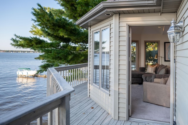 1761 S Shore Dr, Holland, MI 49423 - wooden deck with a water view
