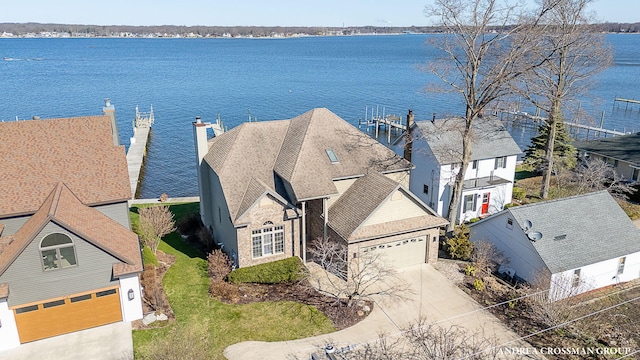 1761 S Shore Dr, Holland, MI 49423 - aerial view with a residential view and a water view