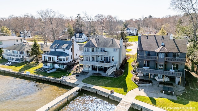 1761 S Shore Dr, Holland, MI 49423 - aerial view with a water view and a residential view