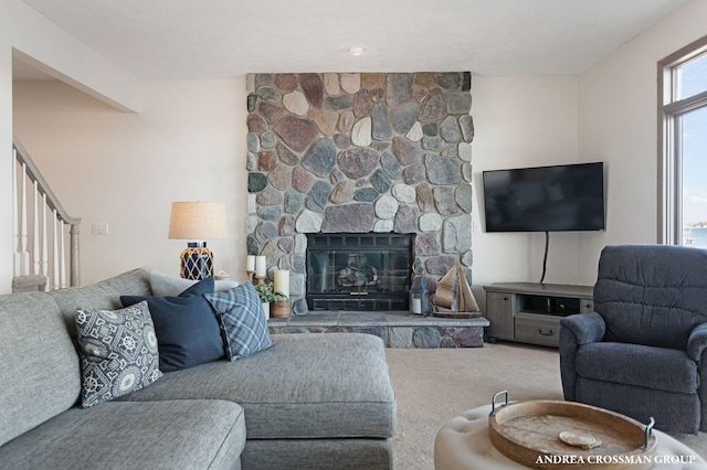 1761 S Shore Dr, Holland, MI 49423 - living room with carpet floors and a stone fireplace