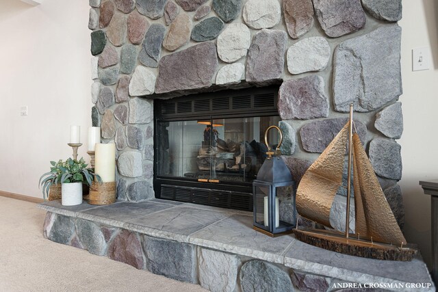 1761 S Shore Dr, Holland, MI 49423 - details with baseboards and a fireplace