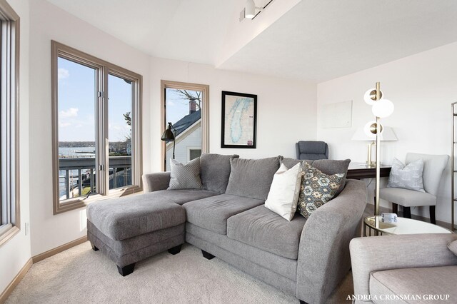 1761 S Shore Dr, Holland, MI 49423 - living area featuring baseboards and light colored carpet