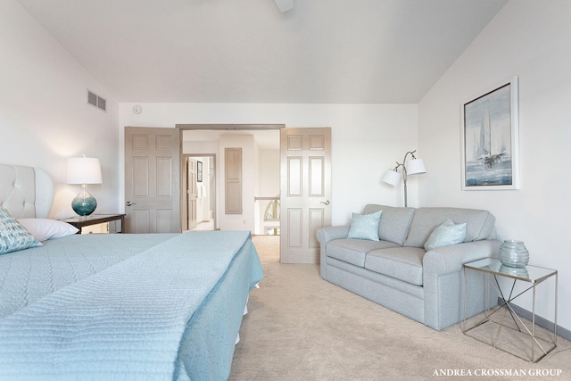 1761 S Shore Dr, Holland, MI 49423 - bedroom with light carpet, lofted ceiling, and visible vents