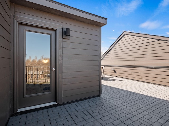 doorway to property with a patio