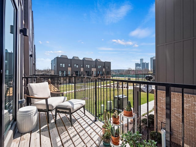 balcony featuring a city view