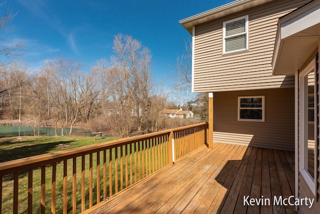 deck featuring a yard