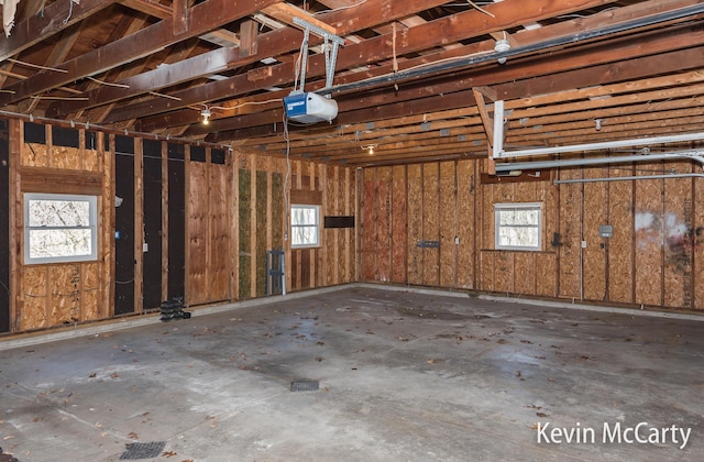 garage featuring a garage door opener