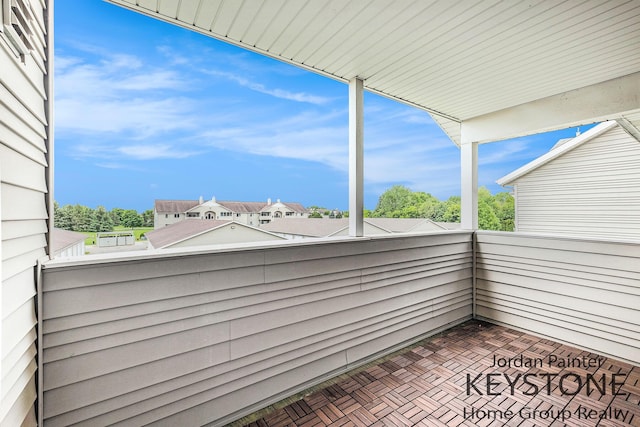 8378 S Jasonville Ct SE Unit 58, Caledonia, MI 49316 - view of patio / terrace featuring a balcony