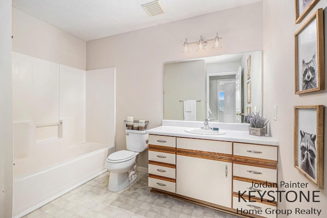 8378 S Jasonville Ct SE Unit 58, Caledonia, MI 49316 - full bathroom featuring toilet, vanity, shower / washtub combination, and tile patterned floors
