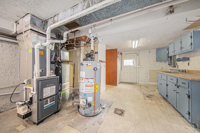 121 Wilkinson St, Chelsea, MI 48118 - utility room featuring heating unit, a sink, and gas water heater